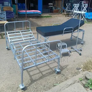 Examination Bed, Ward Bed, Drip Stand and a Drip Stand 