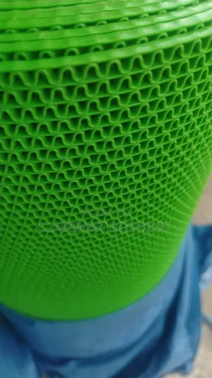 Safe Steps, Secure Spaces With Red and Green Perforated PVC Mats