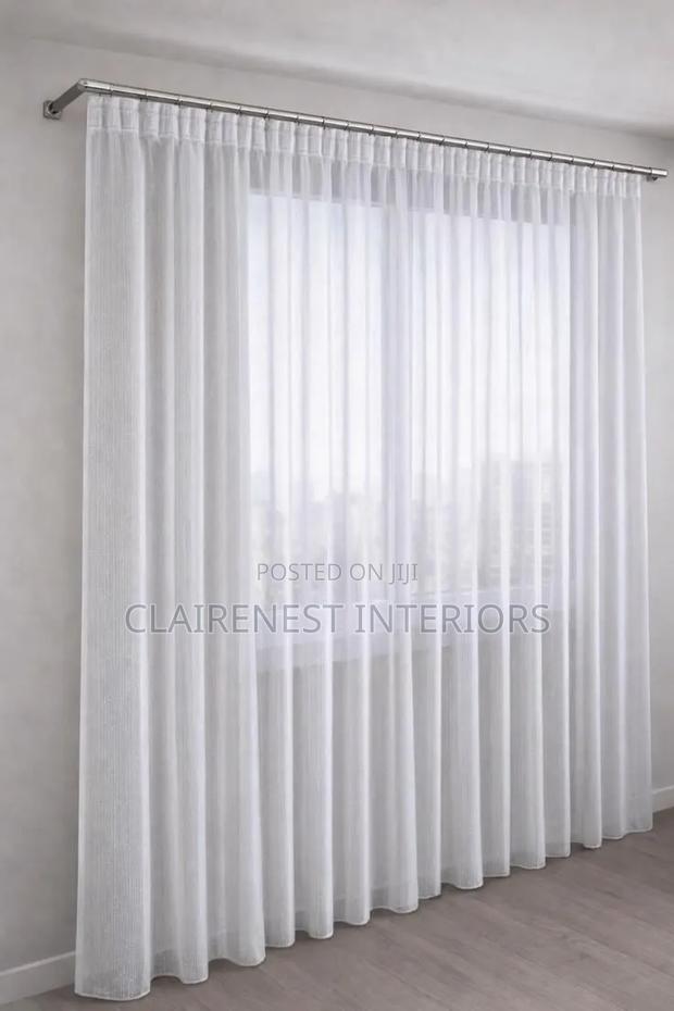 Give Your Room an Elegant Makeover With Plain White Sheers - main view