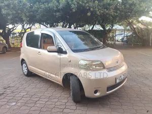 Toyota Porte 2009 Beige