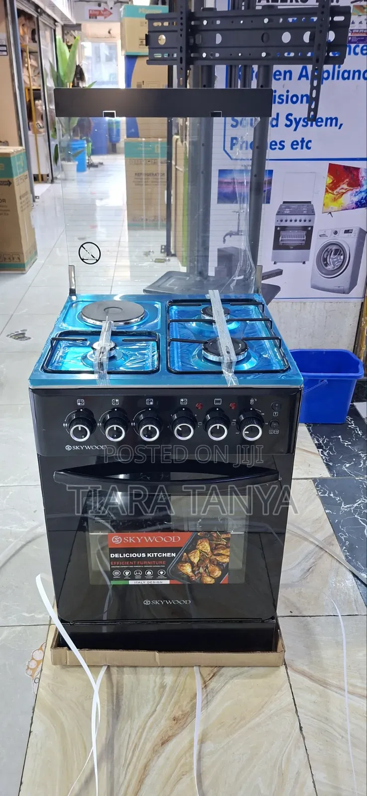 Skywood 50 by 55 3gas and 1 Electric Cooker