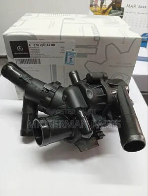 Genuine Mercedes Engine Thermostat Housing/Coolant Thermostat Housing.