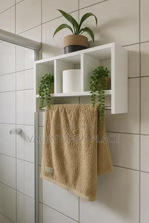 Wall-Mounted White Storage Shelf With Towel Bar