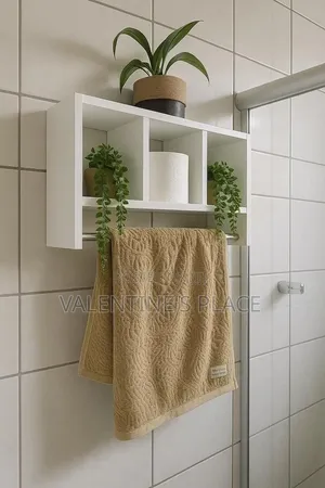 Wall-Mounted White Storage Shelf With Towel Bar