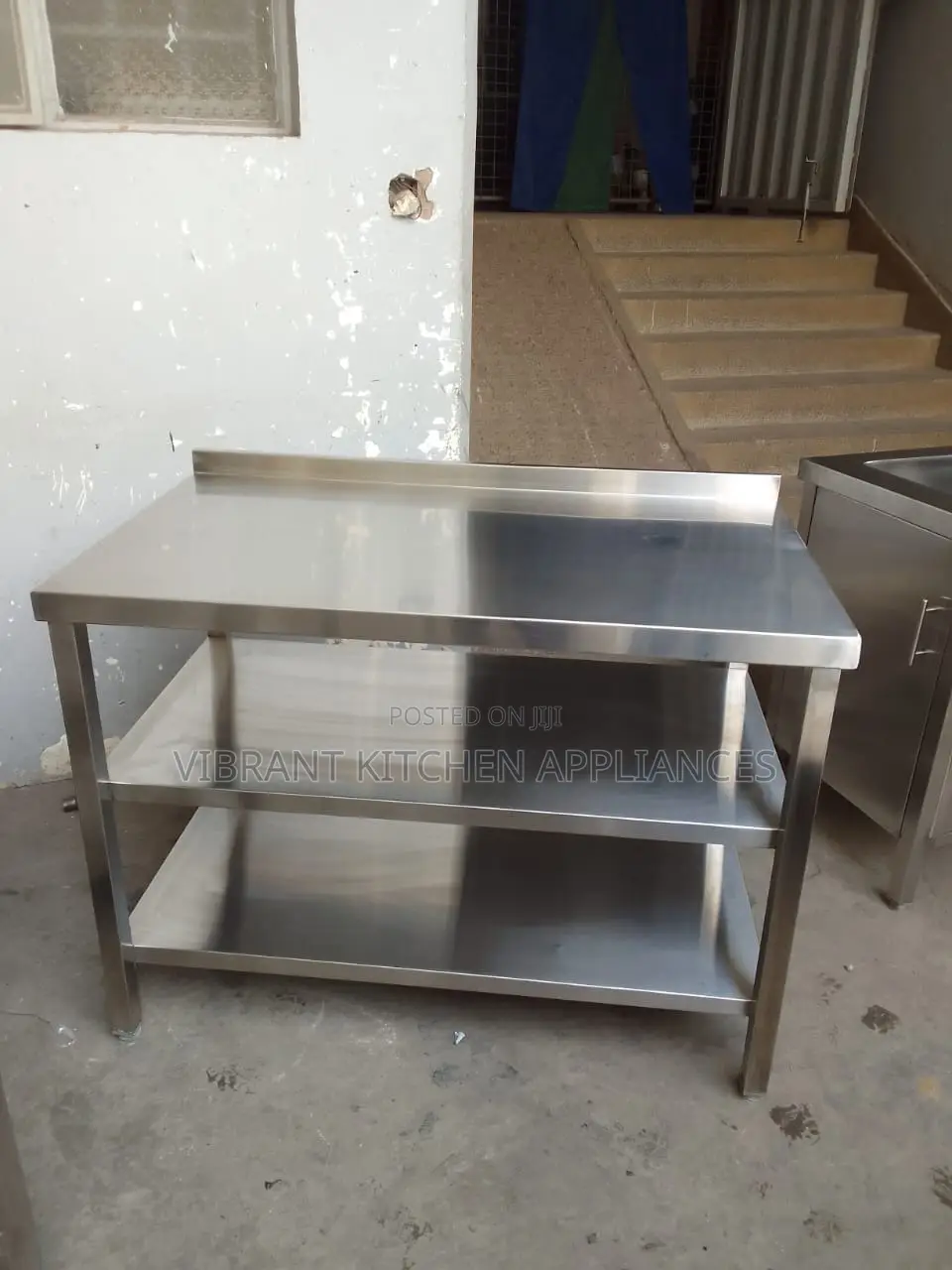 Three-Tier Stainless Steel Table With Backsplash