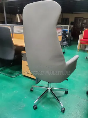 Grey Executive Office Chair With Integrated Headrest