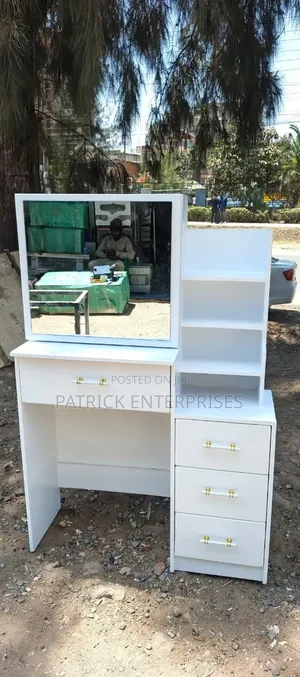 Modern White Dressing Table With a Sliding Mirror With Storage Shelves
