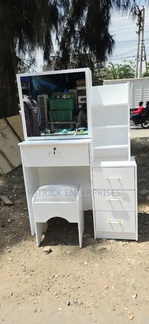 Modern White Dressing Table With a Sliding Mirror With Storage Shelves