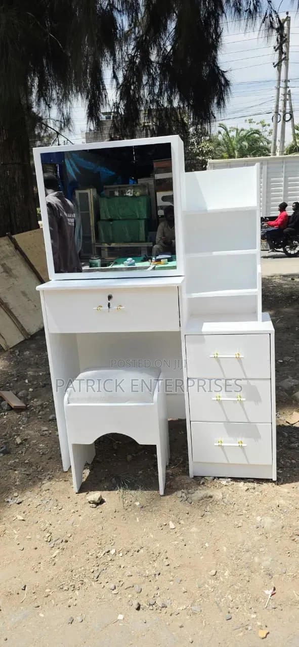 Modern White Dressing Table With a Sliding Mirror With Storage Shelves