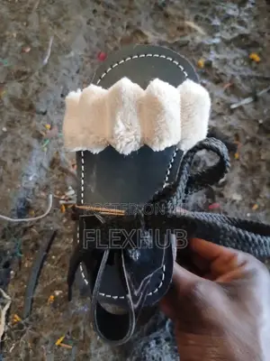Girls Black Flat Sandals With Fuzzy Ruffled Strap and Ankle Ties