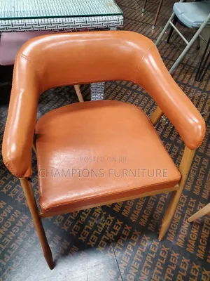Curved Cognac Leather Accent Chair