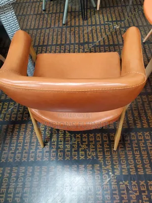 Curved Cognac Leather Accent Chair