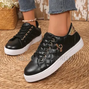 Women's Quilted Low-Top Platform Sneakers.