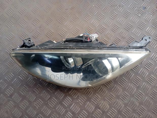 Demio 2010 Headlight Zenon - main view