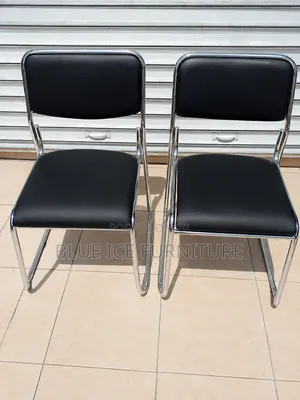 Black Leather Visitor Chair With Chrome Frame