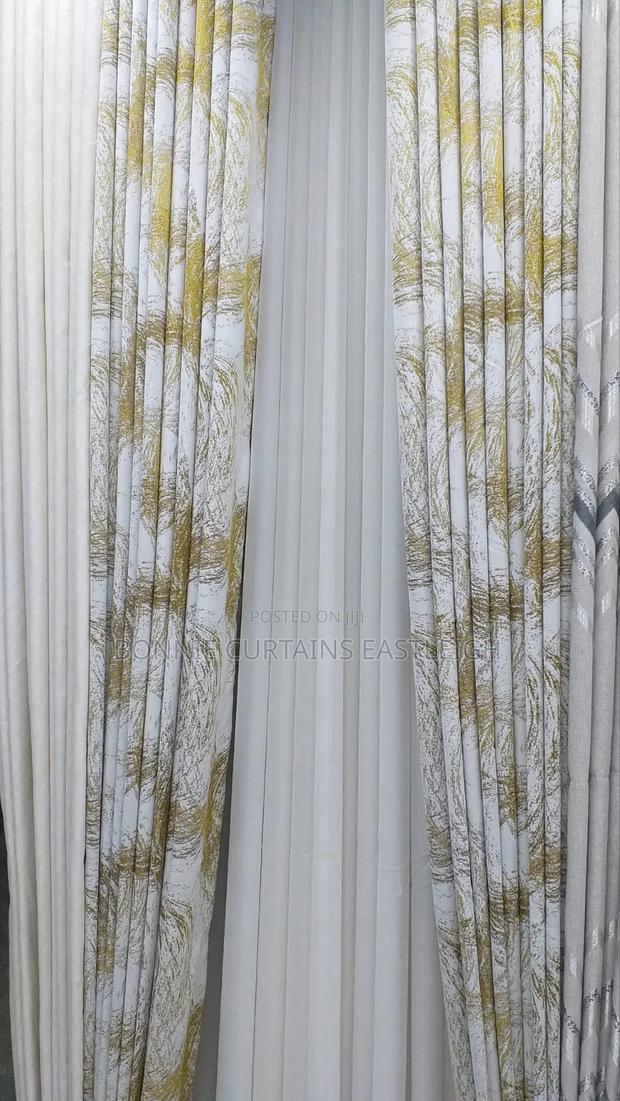 Elegant Gold Curtains and Brown With Rings