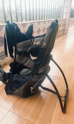 Original Evenflo Snugli Baby Carrier – With Built-in Stand