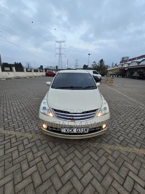 Nissan Tiida 2010 Gold