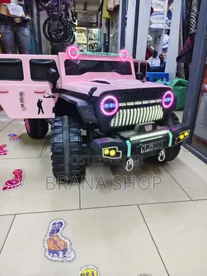 Pink Kids Electric Ride-on SUV Jeep (Model KP-906).