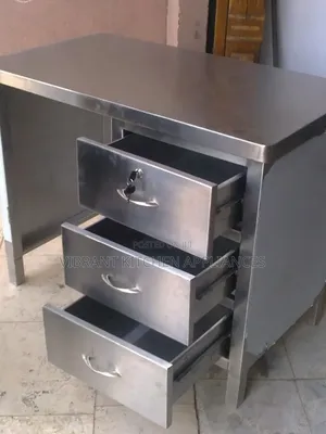 Stainless Steel Table With Three Drawers