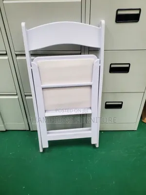 White Padded Resin Folding Event Chair