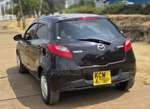 Mazda Demio 2012 Maroon