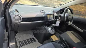 Mazda Demio 2012 Maroon
