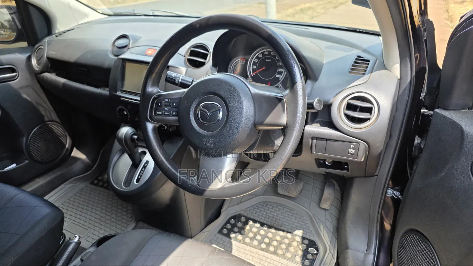 Mazda Demio 2012 Maroon