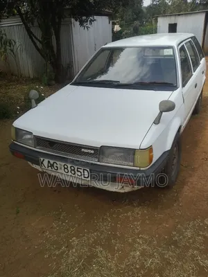 Mazda 323 1996 White
