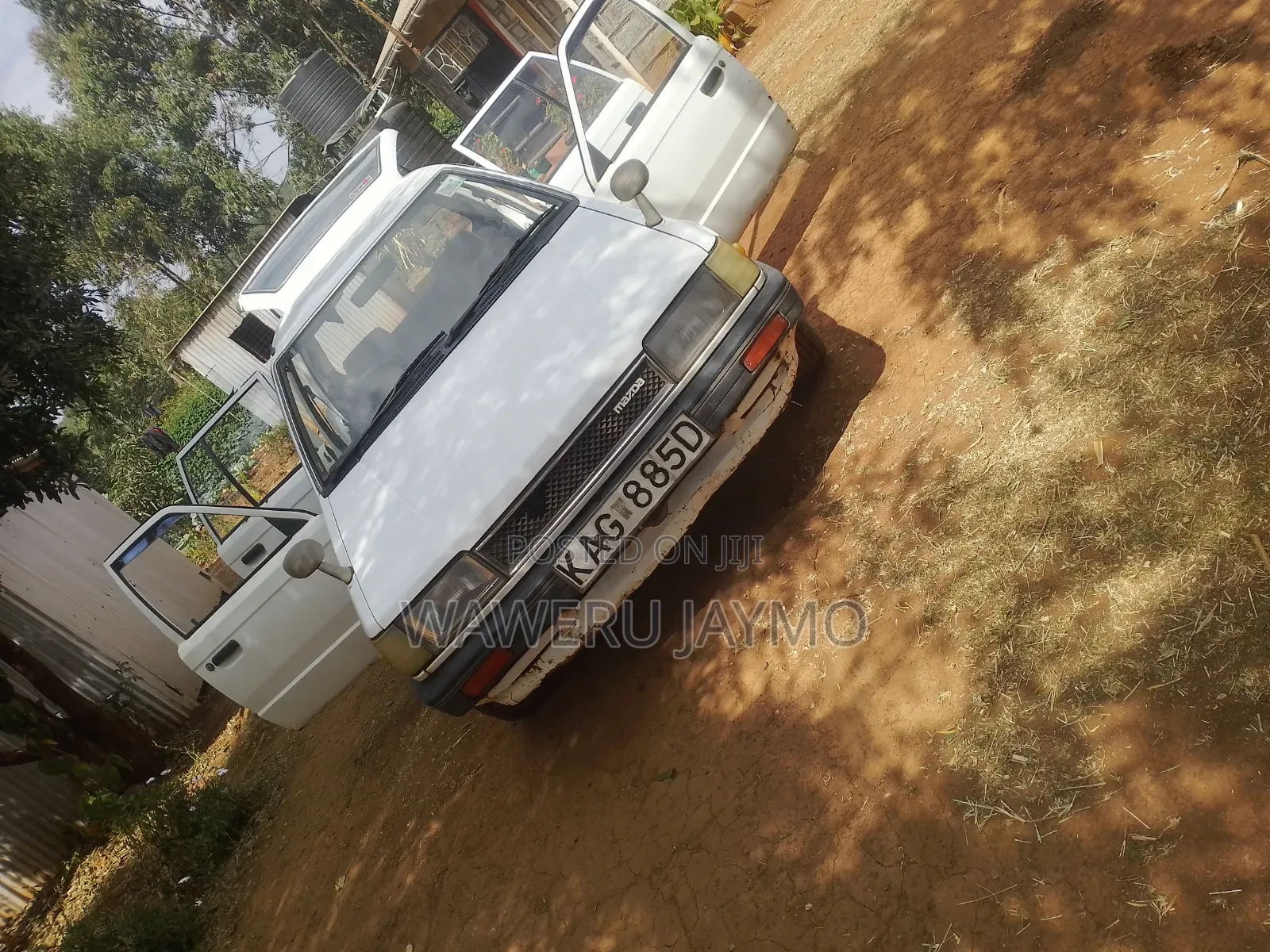 Mazda 323 1996 White
