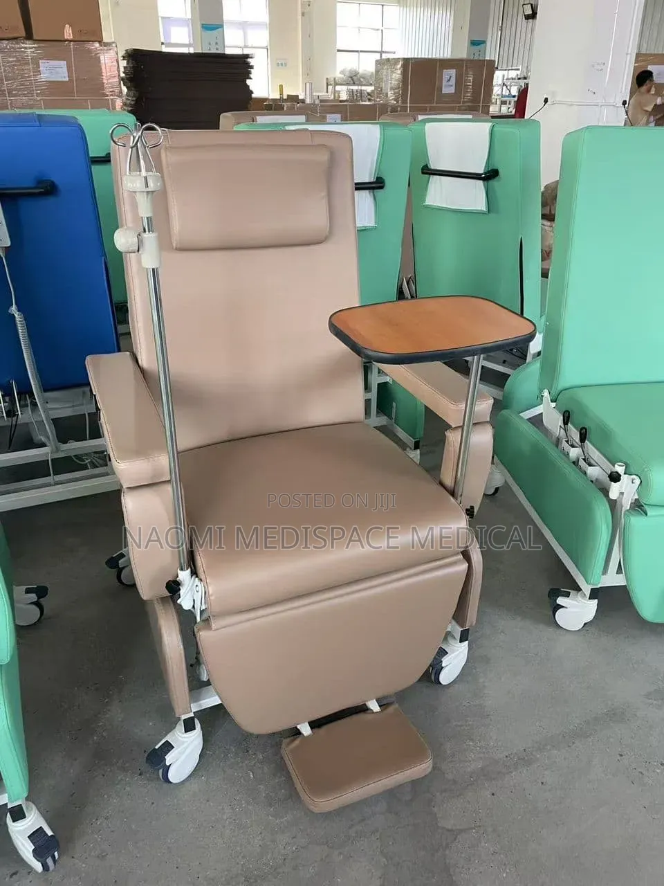 Advanced Manual Dialysis Chair With an Overbed Table and an IV Pole