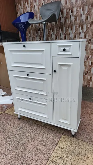 Modern White Bucket Flip Shoe Rack With a Shelving Unit and Top Drawer