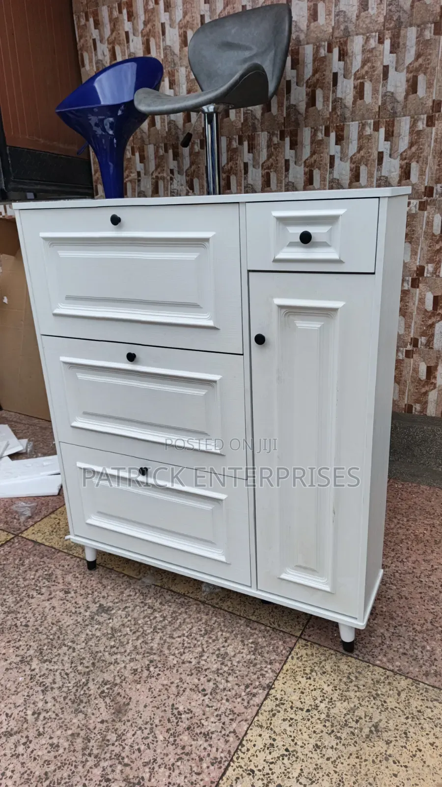 Modern White Bucket Flip Shoe Rack With a Shelving Unit and Top Drawer