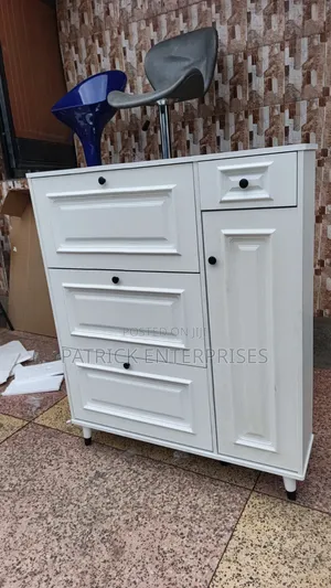 Modern White Bucket Flip Shoe Rack With a Shelving Unit and Top Drawer