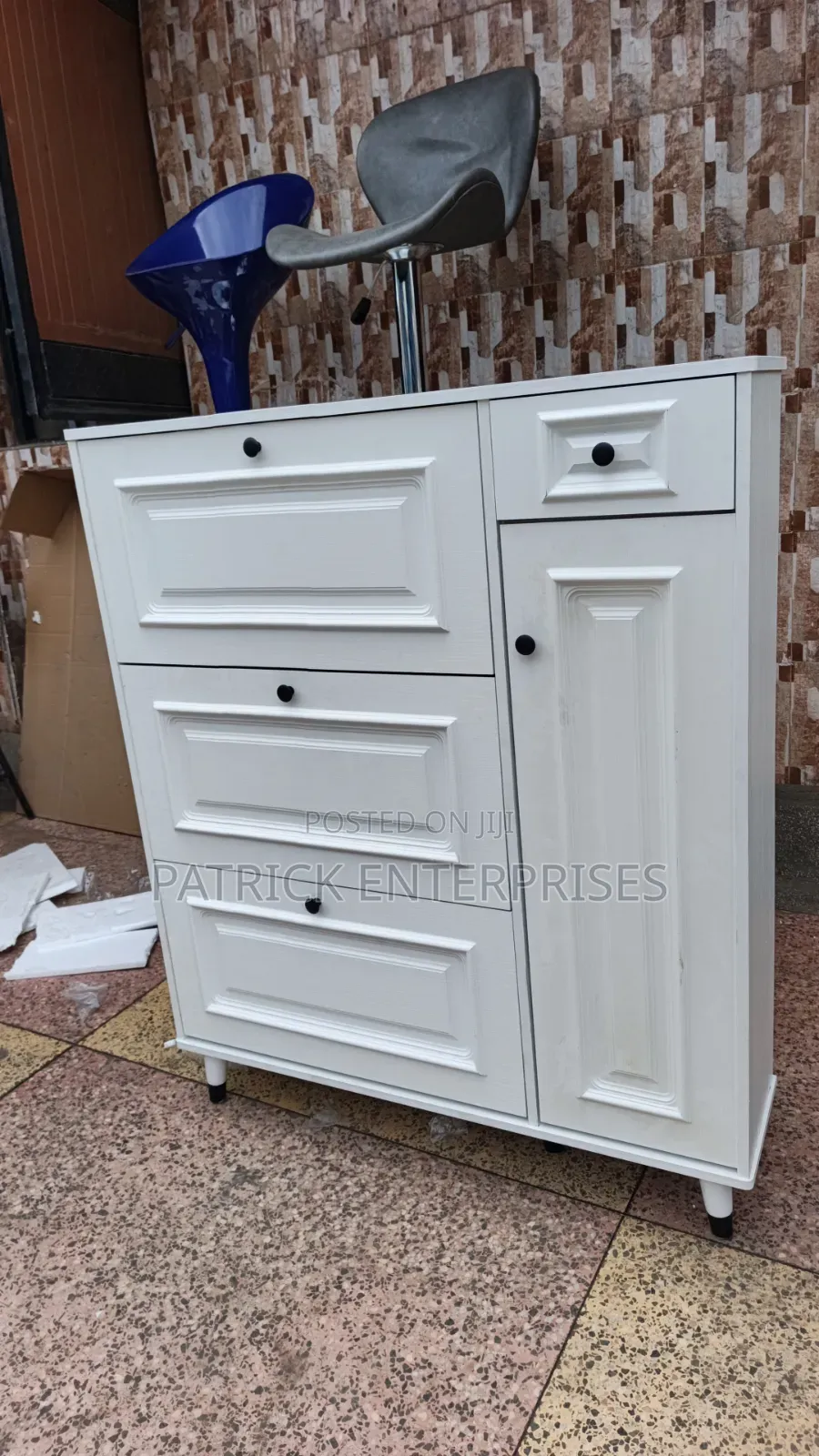 Modern White Bucket Flip Shoe Rack With a Shelving Unit and Top Drawer