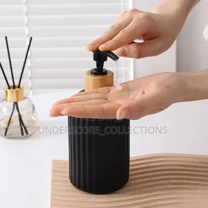 Black and Gold Tip Glass Liquid Dispenser Container