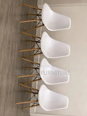 Modern White Dining Chair – Wooden Legs Stylish Design