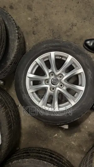 16” Original Axela Rims Set With Tyres