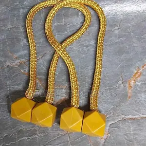 Stylish Magnetic Light Grey and Yellow Tiebacks for Every Room.