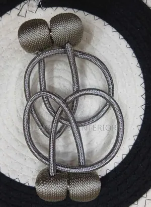 Make Your Home Décor More Polished With Grey and White Tiebacks