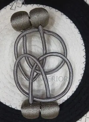 Make Your Home Décor More Polished With Grey and White Tiebacks
