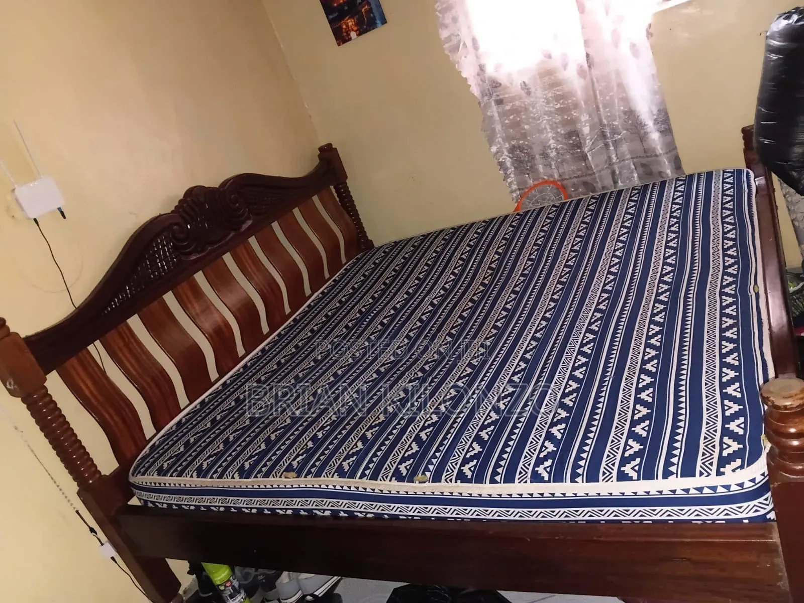 Mahogany 6 by 6 Bed Slightly Used but in Good Condition.
