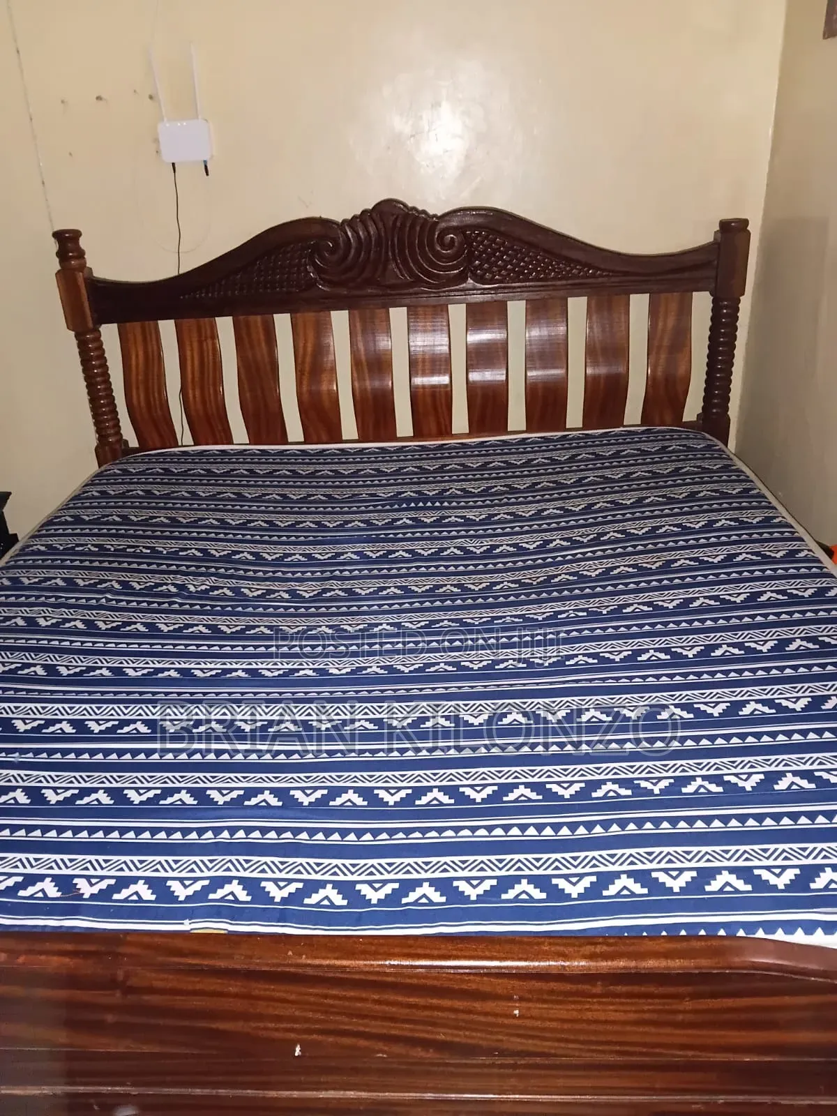 Mahogany 6 by 6 Bed Slightly Used but in Good Condition.