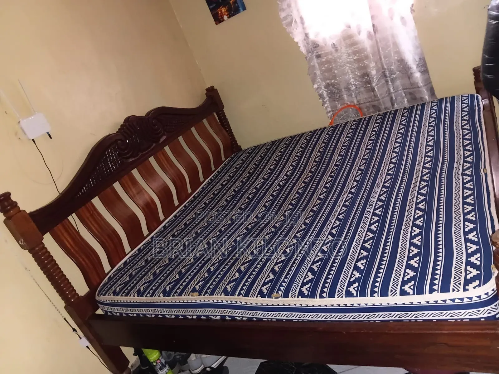 Mahogany 6 by 6 Bed Slightly Used but in Good Condition.