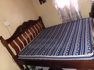 Mahogany 6 by 6 Bed Slightly Used but in Good Condition.