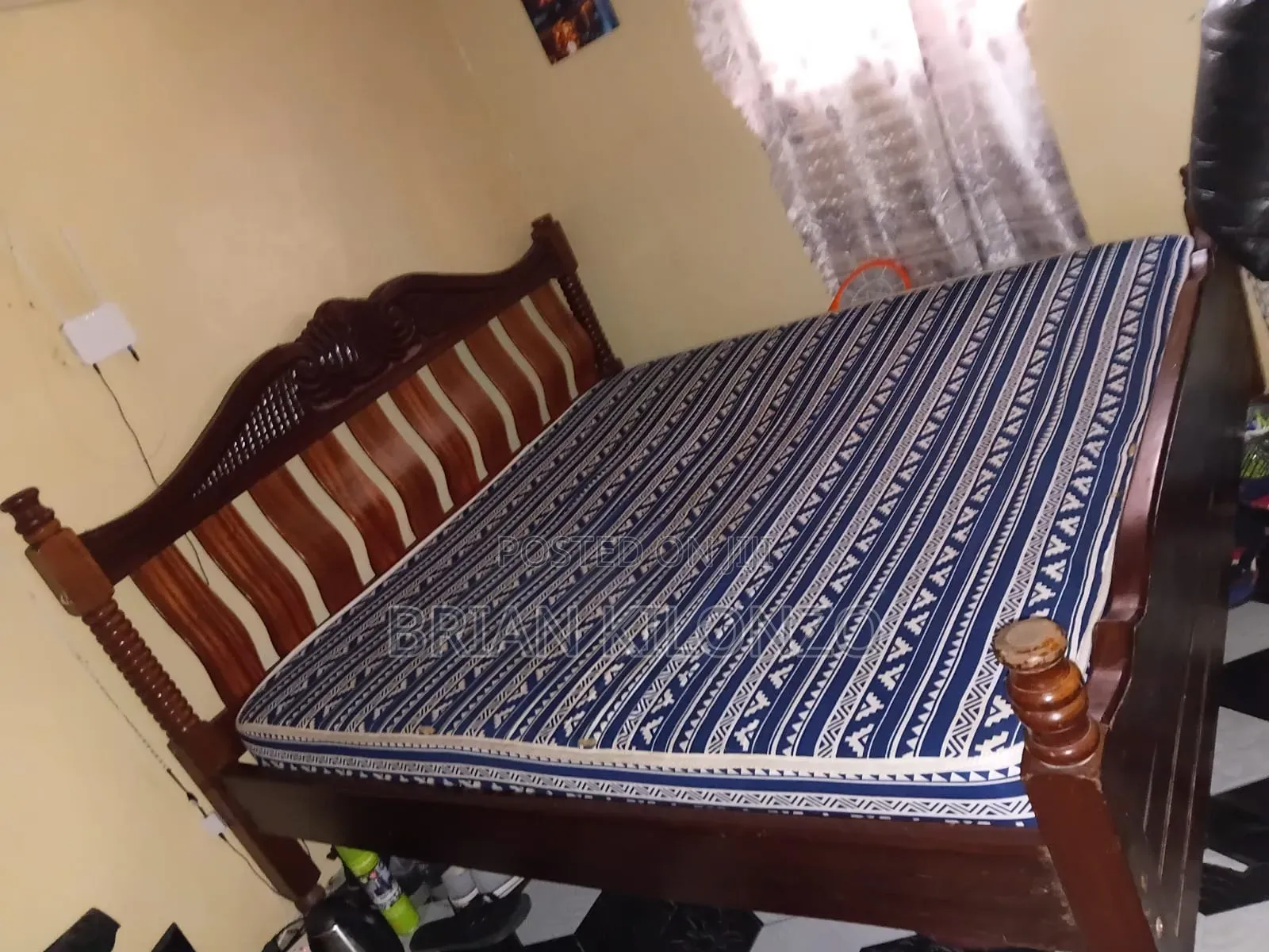 Mahogany 6 by 6 Bed Slightly Used but in Good Condition.