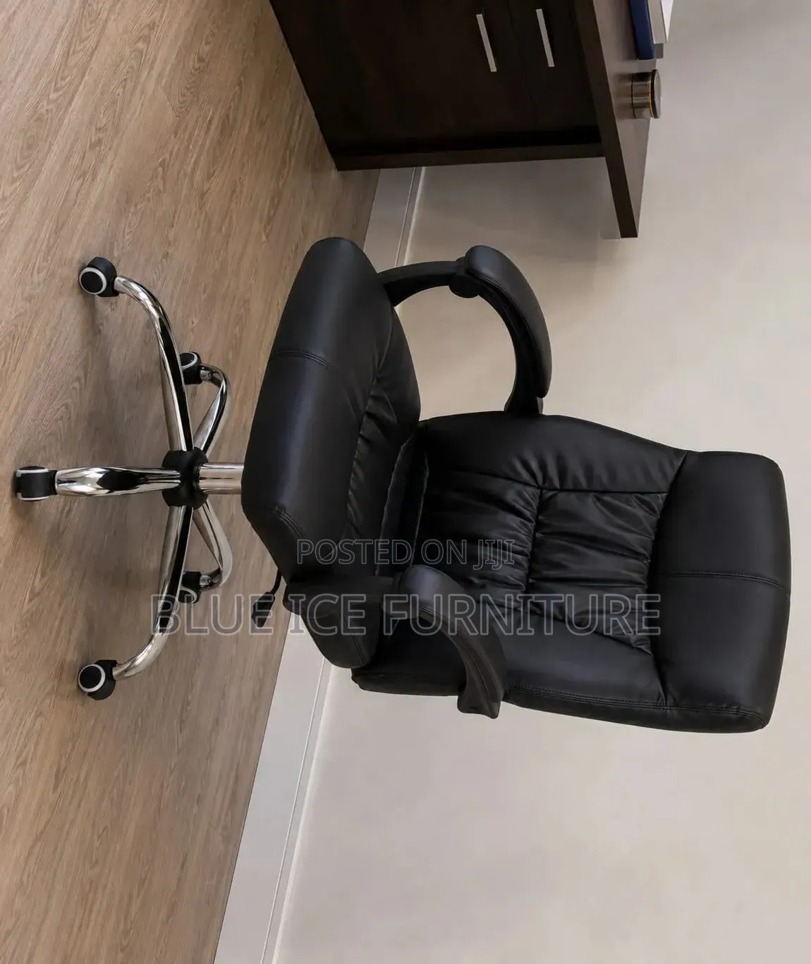 Black Executive Office Chair With Padded Backrest Armrests