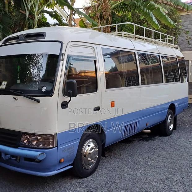 Toyota Coaster 2012 White - thumbnail 2