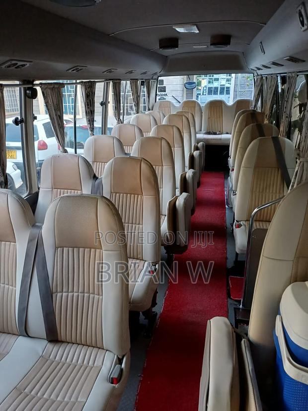 Toyota Coaster 2012 White - thumbnail 4