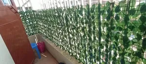 Enjoy Privacy With a Modern Green Finish With Artificial Privacy Fence